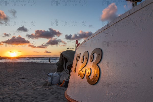 Fishing boat in sunset