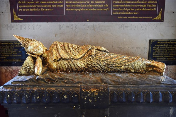 Buddha statue covered with gold leaf