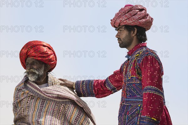 Member of the Dhebariya Rabari community in traditional colorful dress