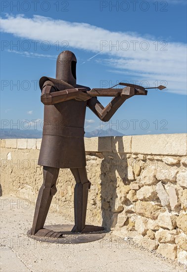 Metal statue of knight in armor