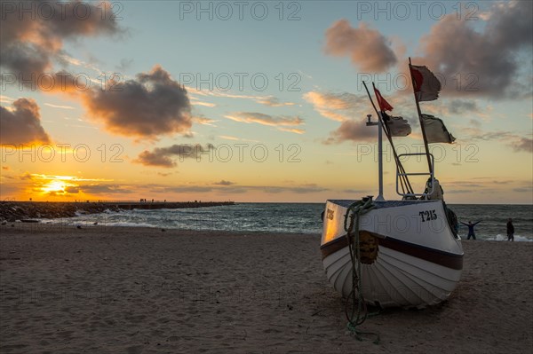 Fishing boat in sunset