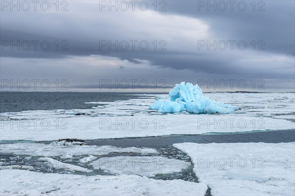 Blue iceberg drifting in Hinlopen Strait