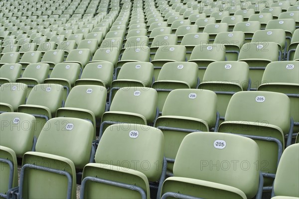 Green folding seats on the grandstand of the Seebuehne