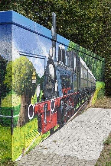 Circuit breaker panel painted with an old train