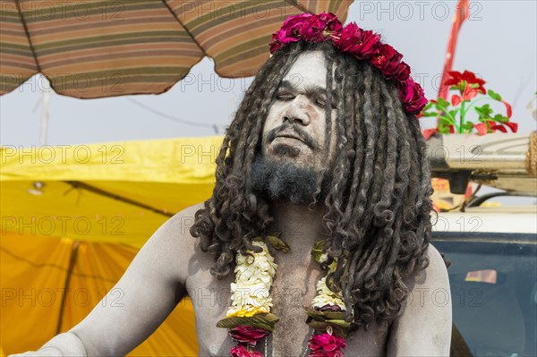 Sadhu covered with white ashes