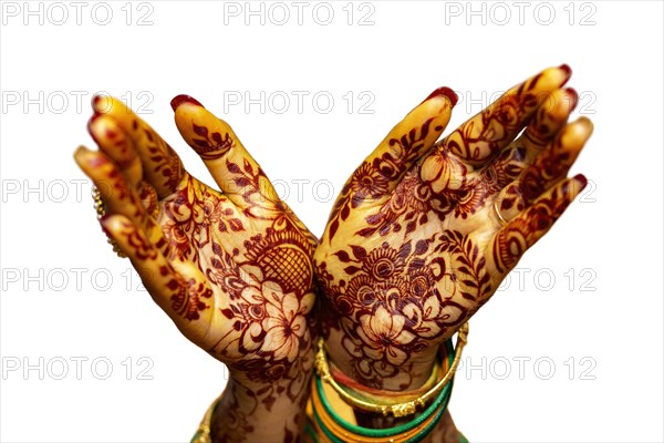 Indian Bride's hand painted with mehndi isolated on white background. Mauritius