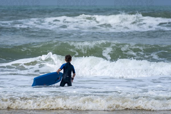 Boy with bodyboard