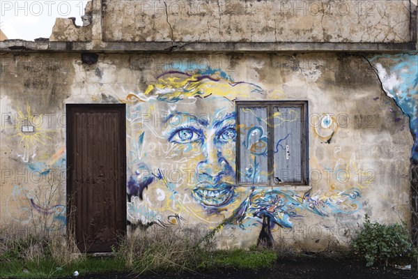 Old house with graffiti