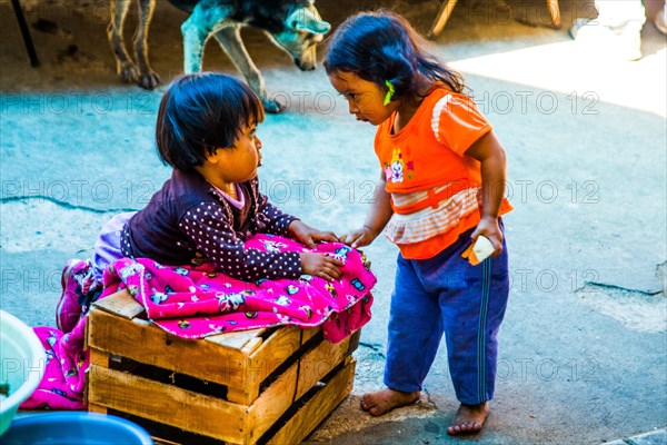 Children playing at the market