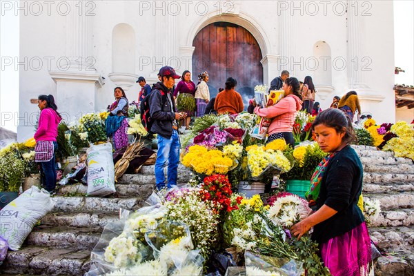 Picturesque rituals and flower offerings on the steps of Santo Tomas