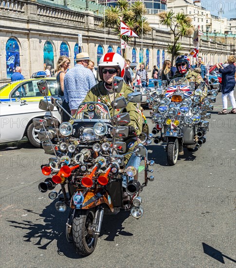 Rider on custom scooter