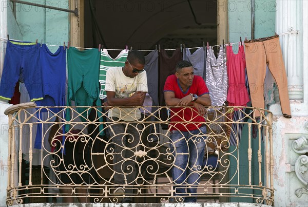 Two dark-skinned young men