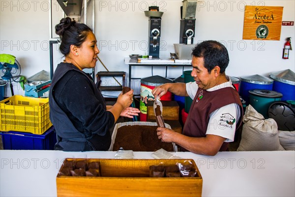 Coffee being weighed