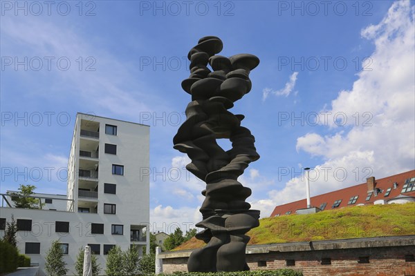Large bronze sculpture by the artist Tony Cragg in the sculpture garden near the Venet House
