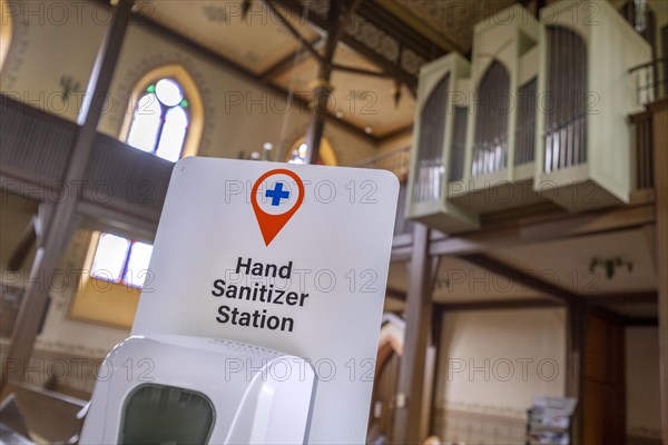 Hand disinfector in the Protestant town church