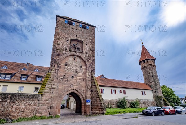 St. Martin's Gate with depiction of St. Martin sharing his coat on a horse and witch's tower