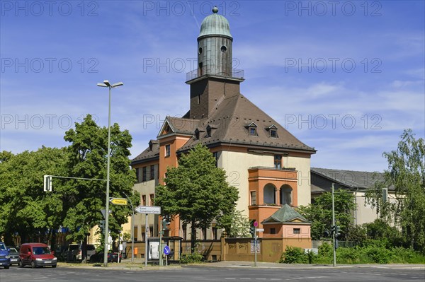 Apartment building with copper tower