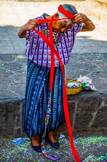 Demonstration of how to tie a typical headdress of the Tzutuhil woman