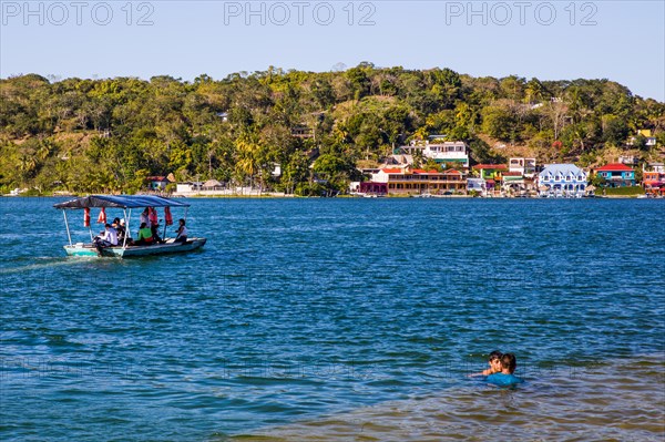 Flores is located on an island in the small Peten-Itza Lake