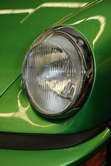 Classic round headlight from historic Porsche 911 G model