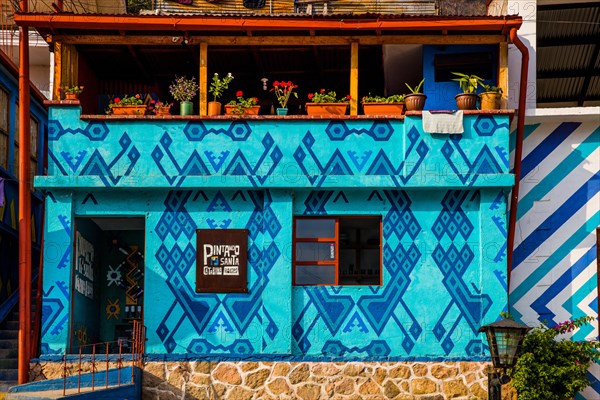 Houses painted with traditional Mayan patterns