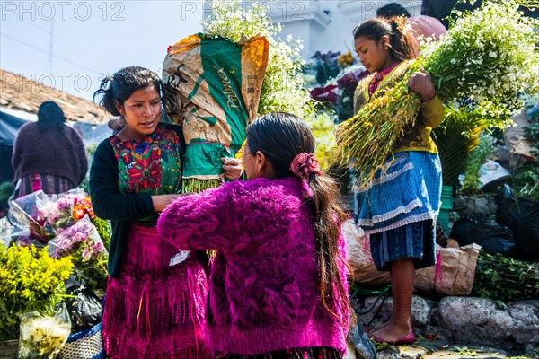 Picturesque rituals and flower offerings on the steps of Santo Tomas