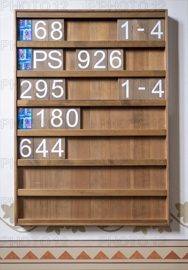 Panel with posted songs in the protestant town church