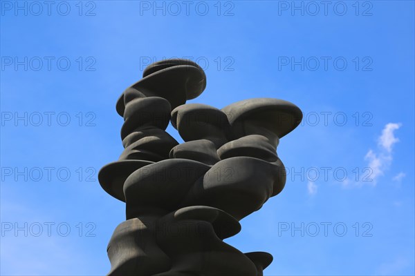 Large bronze sculpture by the artist Tony Cragg in the sculpture garden near the Venet House