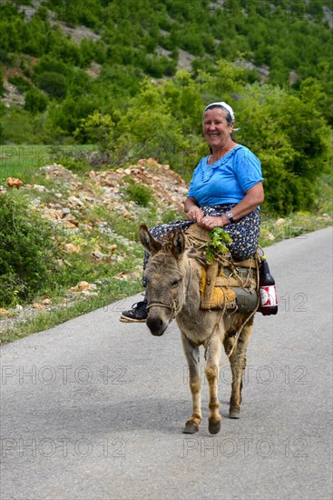 Woman on a donkey