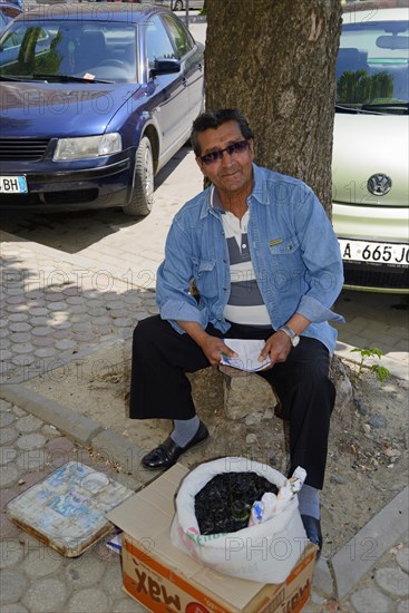 Man selling sunflower seeds