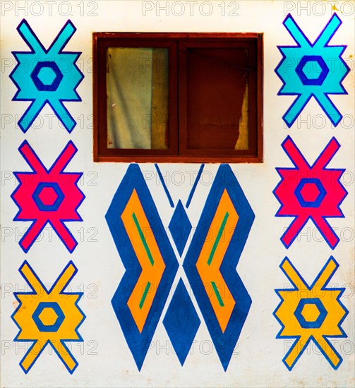 Houses painted with traditional Mayan patterns