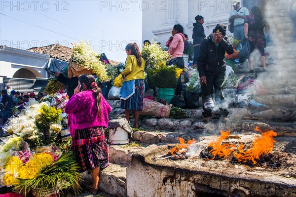 Picturesque rituals and flower offerings on the steps of Santo Tomas