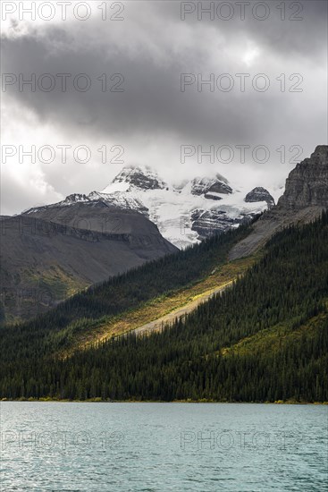 Cloudy snow-capped peaks