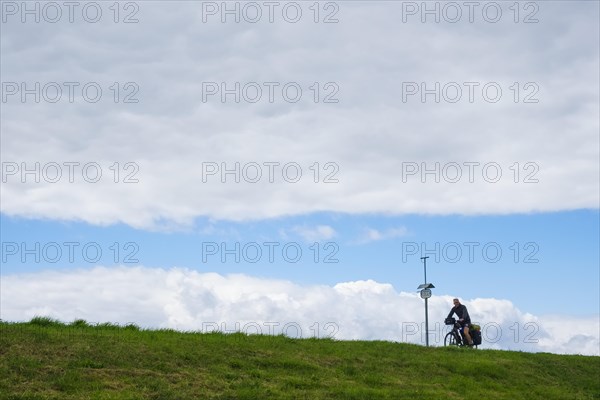 Cyclist on Elbe dyke near Vockfey