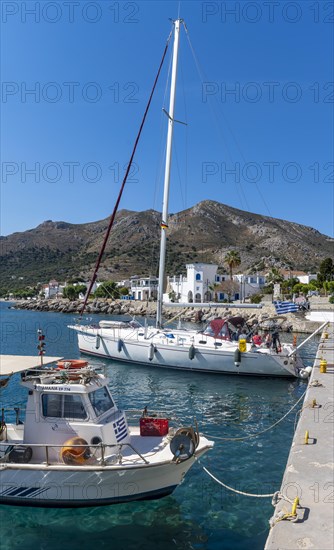 Sailboats in the harbour of Livadia on Tilos Island