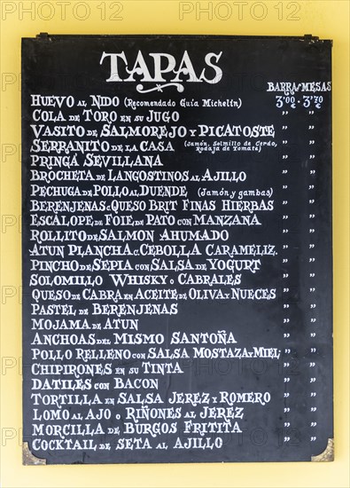 Menu with different tapas at a tapas bar