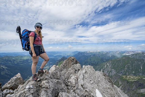 Mountaineer at the summit of the Maedelegabel