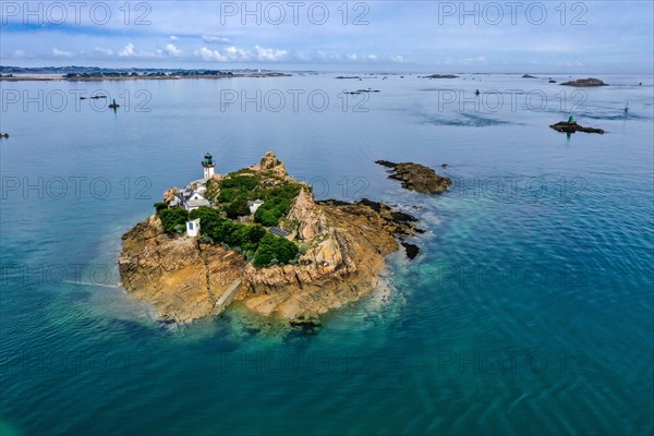 Drone shot of Ile Louet with the lighthouse and the countless small islands off the coast