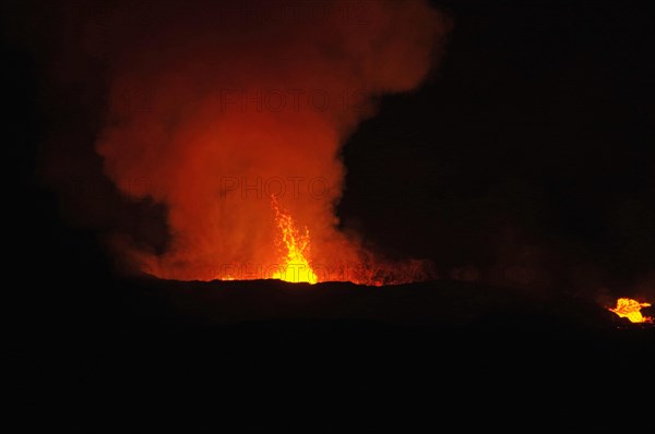 Lava fountains shoot into the sky