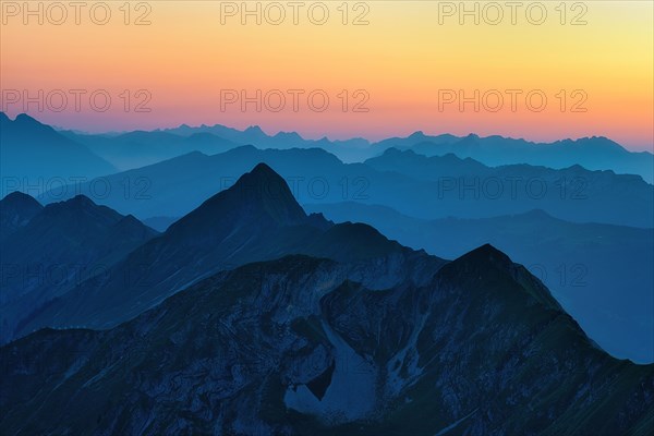 View of Bernese Alps at dusk from Brienzer Rothorn