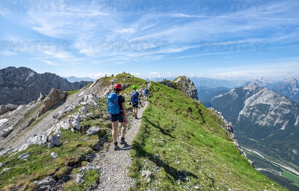 Mountaineers hiking on a ridge