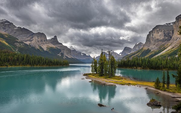 Spirit Island in the turquoise blue glacial lake Maligne Lake