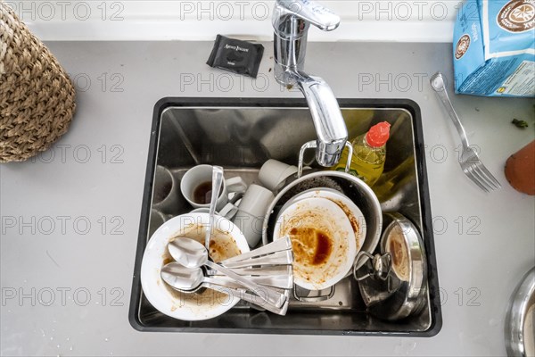 Dirty dishes in a sink