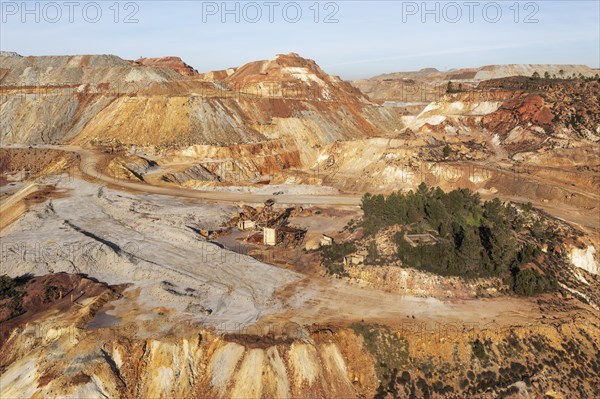 Dramatically scarred landscape of mineral-rich ground and rock at the Rio Tinto mines