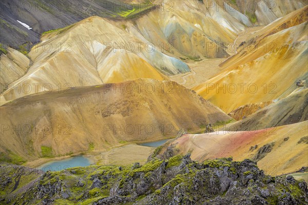 View from Brennisteinsalda of turquoise lake and colourful rhyolite mountains