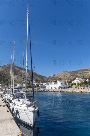 Sailboats in the harbour of Livadia on Tilos Island