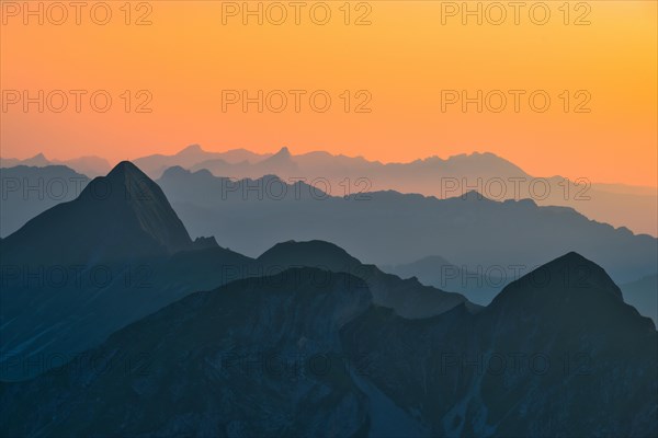 View of Bernese Alps at dusk from Brienzer Rothorn