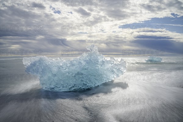 Icebergs on the black lava beach Diamond beach
