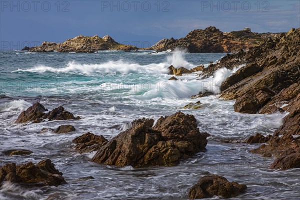 Stormy sea on the rocky coast of Isola Maddalena