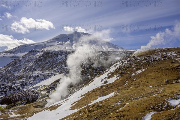 Hot spring area Hveradalir and behind it Mount Maenir